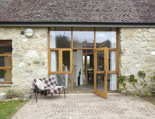 Rear of the old barn- enclosed garden area.