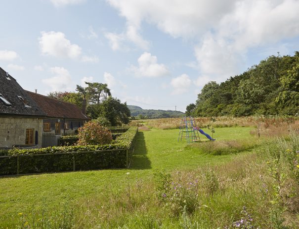 Play area to the rear of the cottages